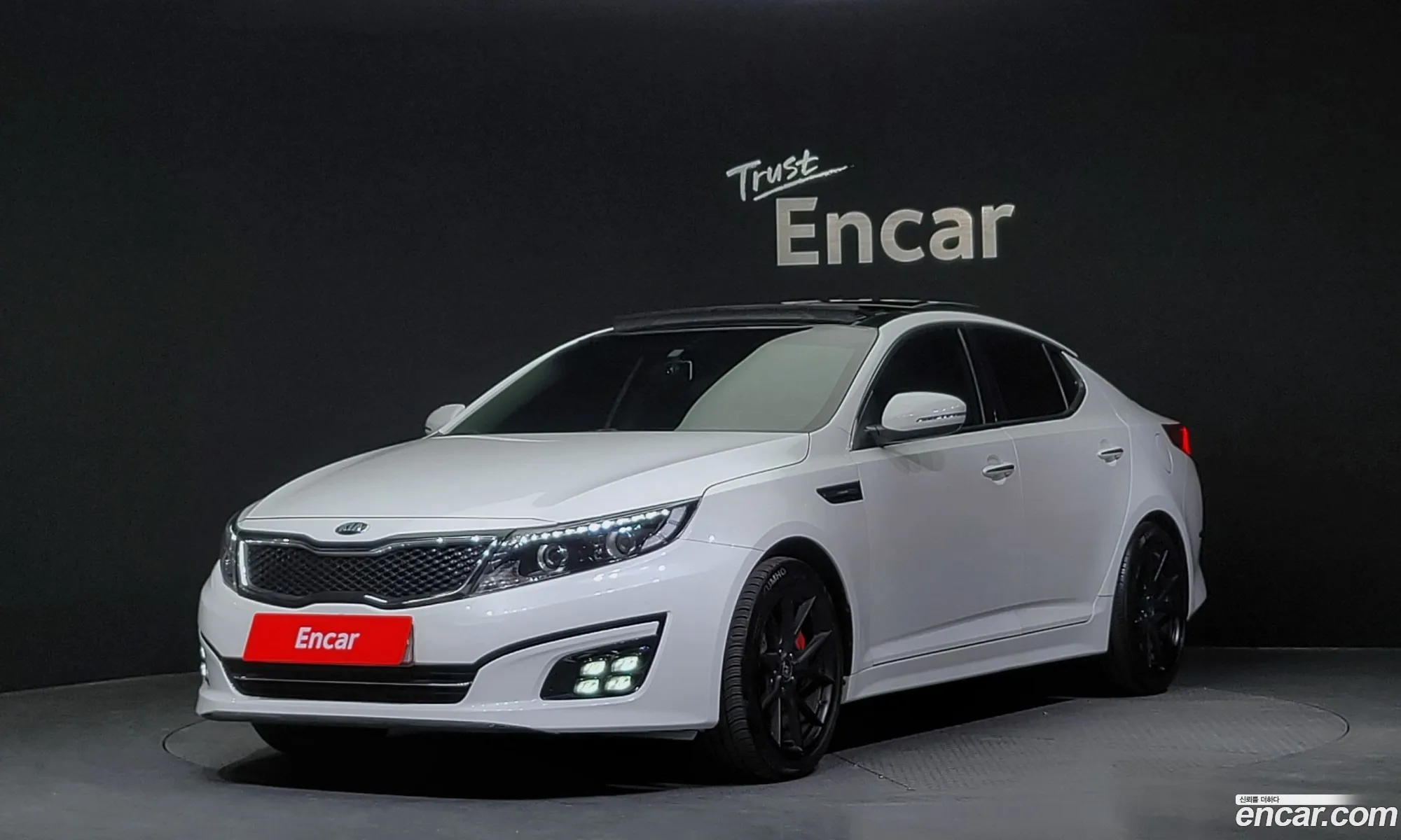Kia K5 Prestige 2015 - фотография 11812894