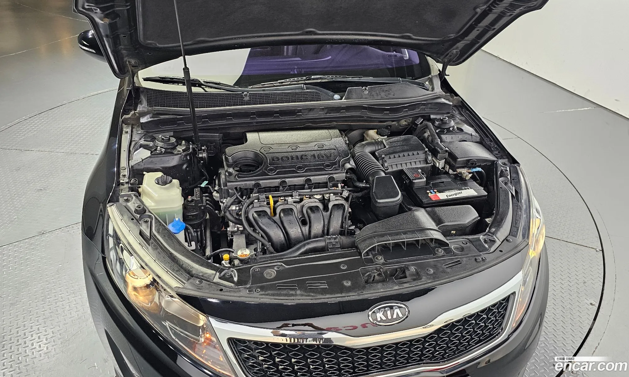 Kia K5 I 20 Deluxe 2011 - фотография 12412261