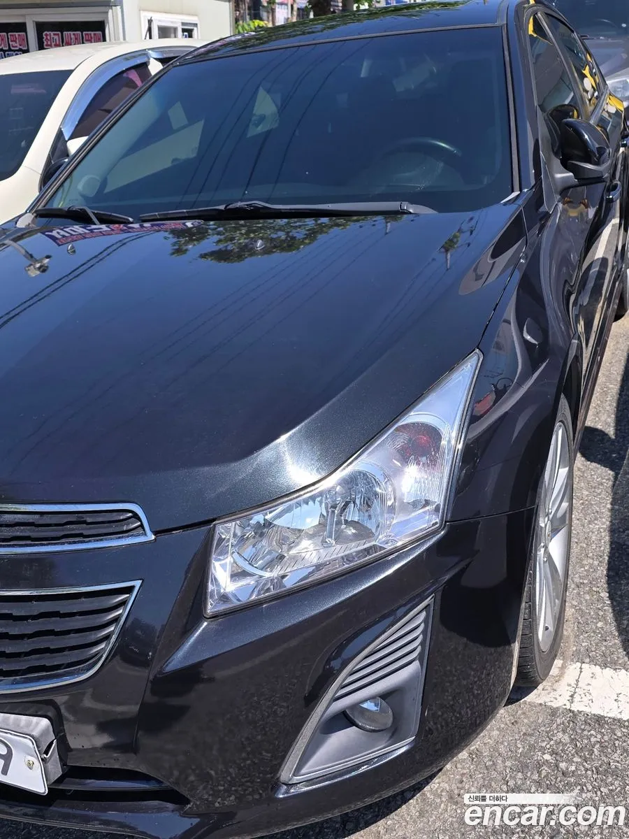 Chevrolet Cruze I 20 Ltz The Perfect Black 2014 - фотография 5452477