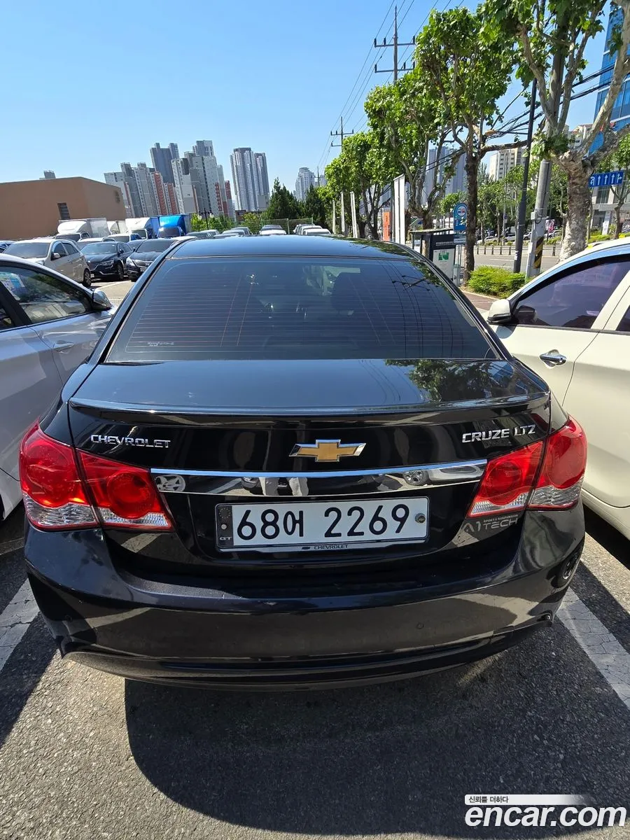 Chevrolet Cruze I 20 Ltz The Perfect Black 2014 - фотография 5452479