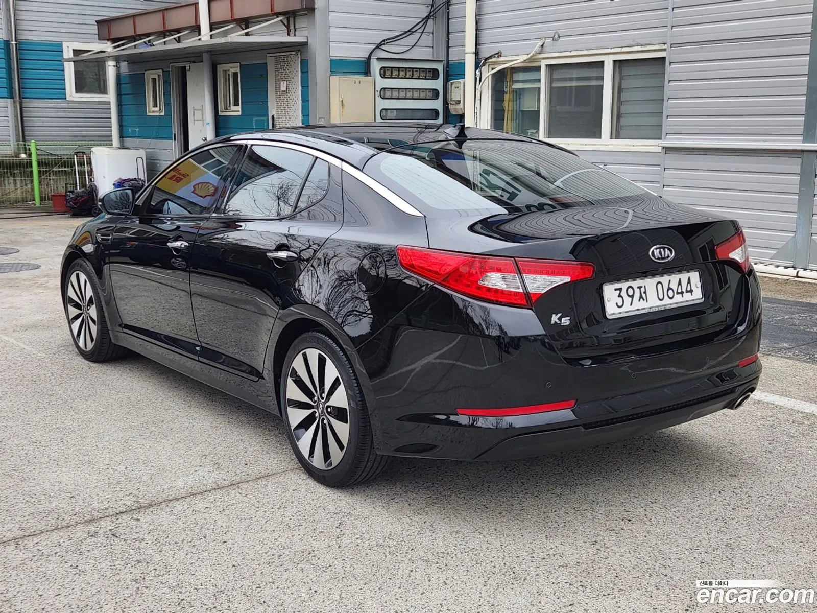 Kia K5 I 20 Prestige 2012 - фотография 18993619