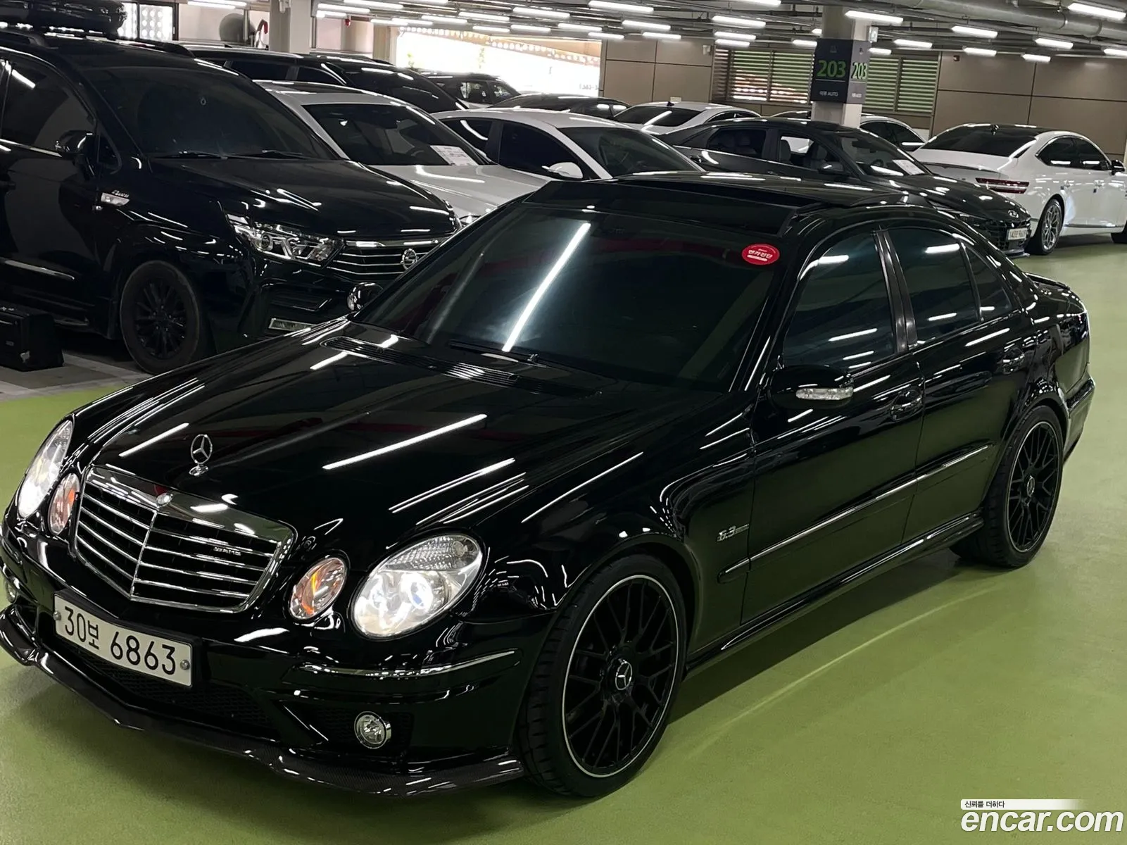 Mercedes E-Class W211 E55 Amg - фотография 12681262