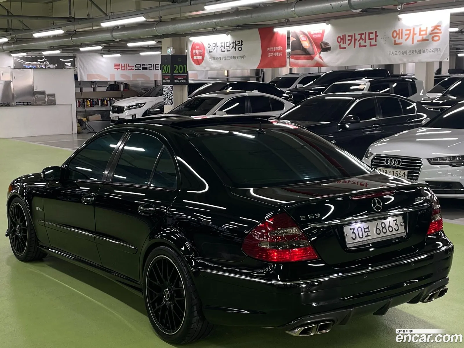 Mercedes E-Class W211 E55 Amg - фотография 12681263