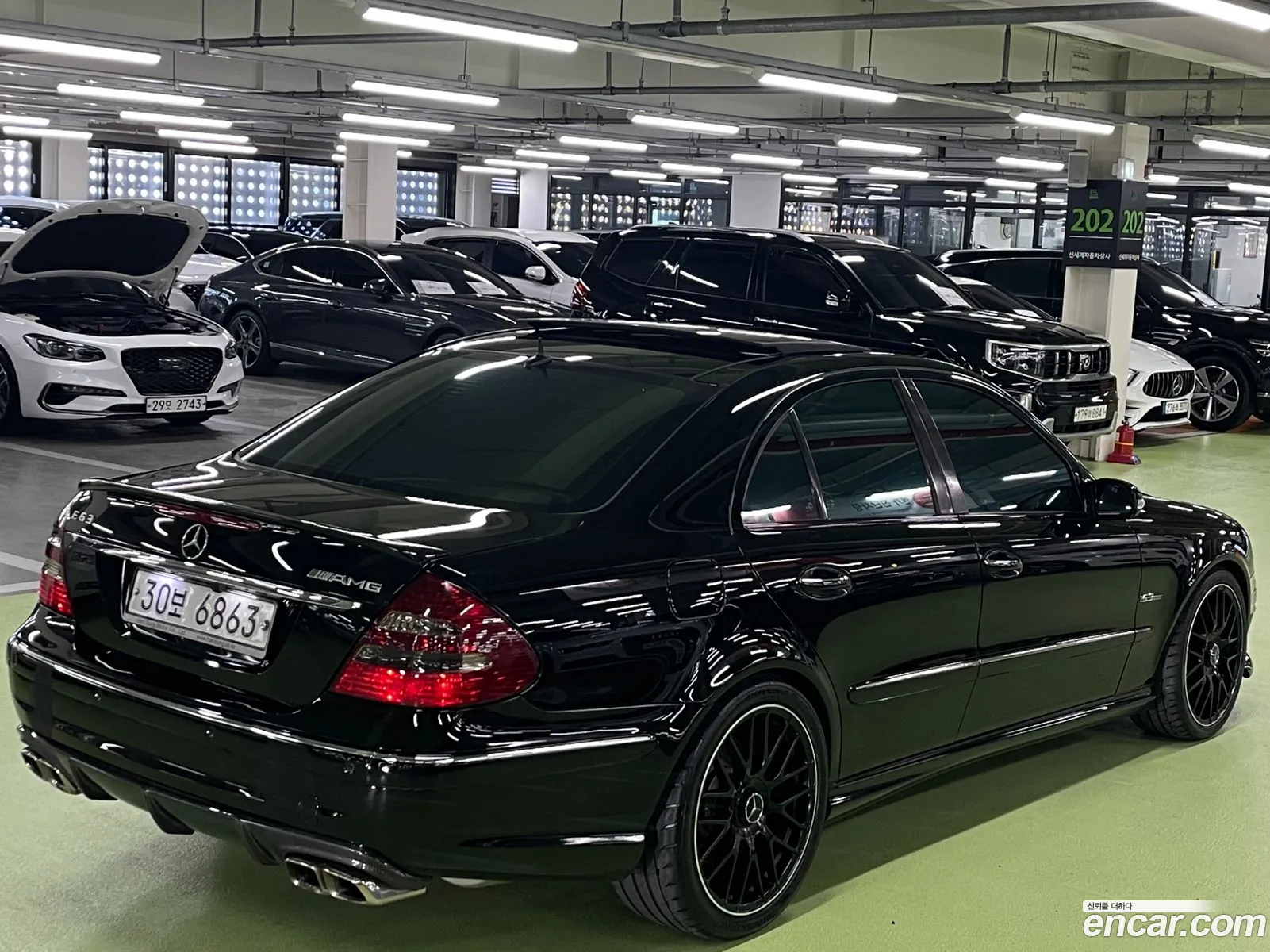 Mercedes E-Class W211 E55 Amg - фотография 12681264