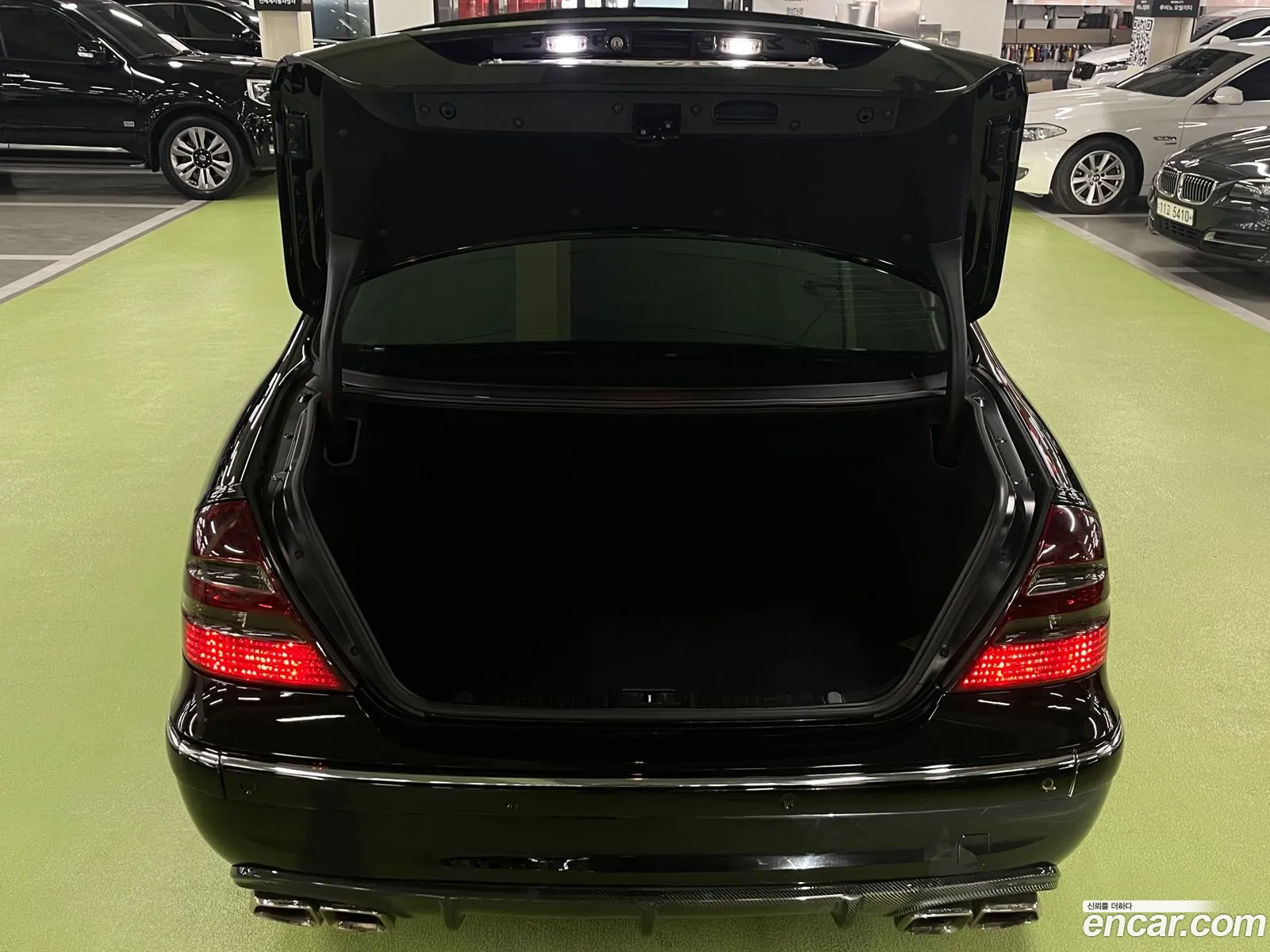 Mercedes E-Class W211 E55 Amg - фотография 12681266