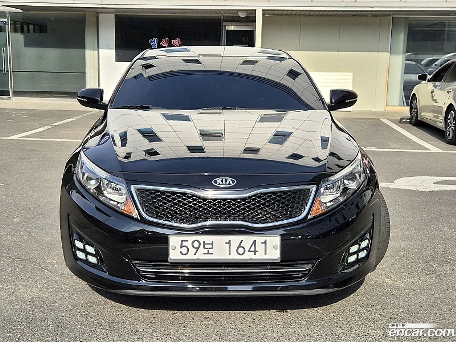Kia K5 Luxury 2015 - фотография 18837463