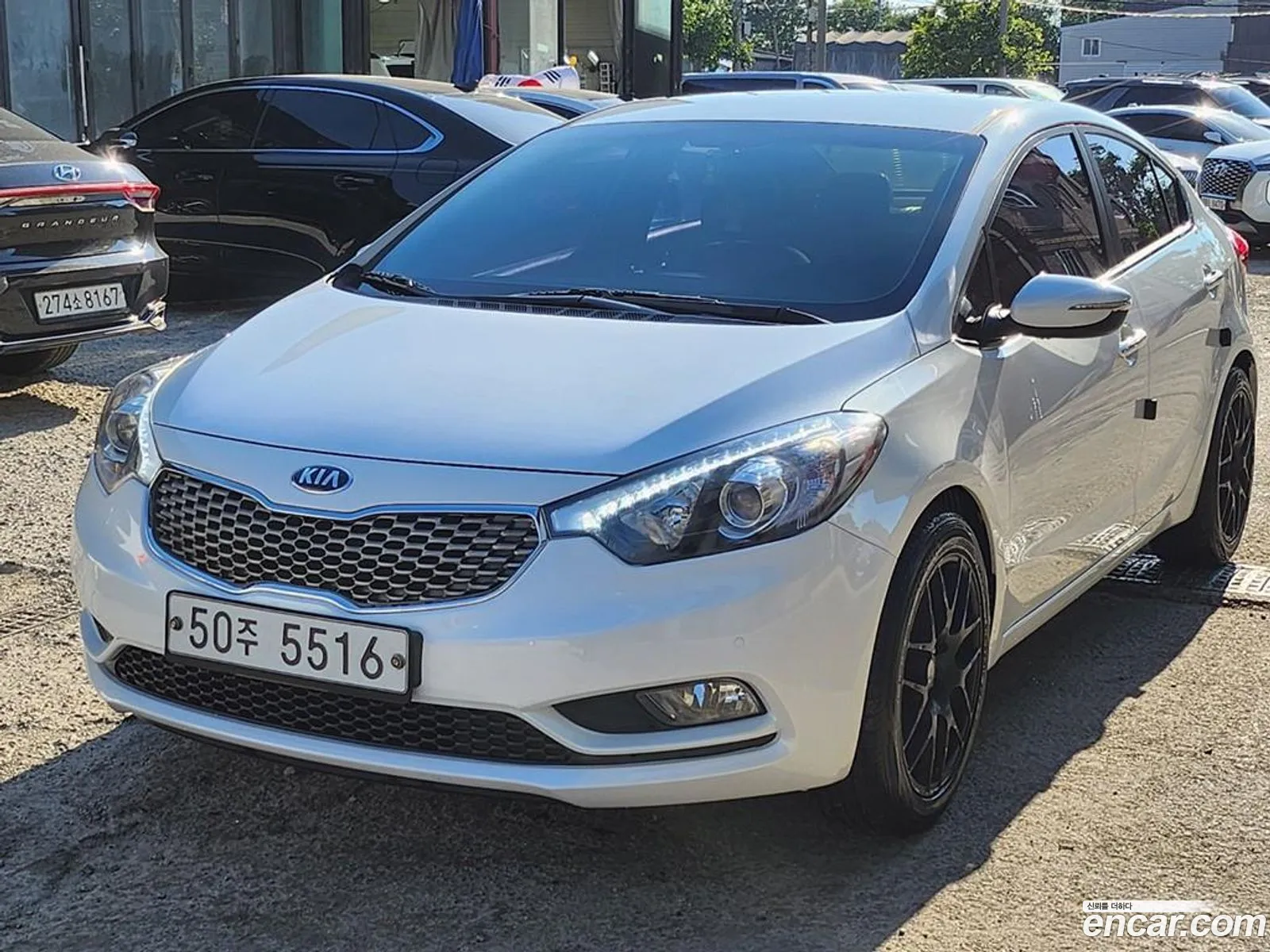 Kia K3 I Prestige 2013 - фотография 12358553