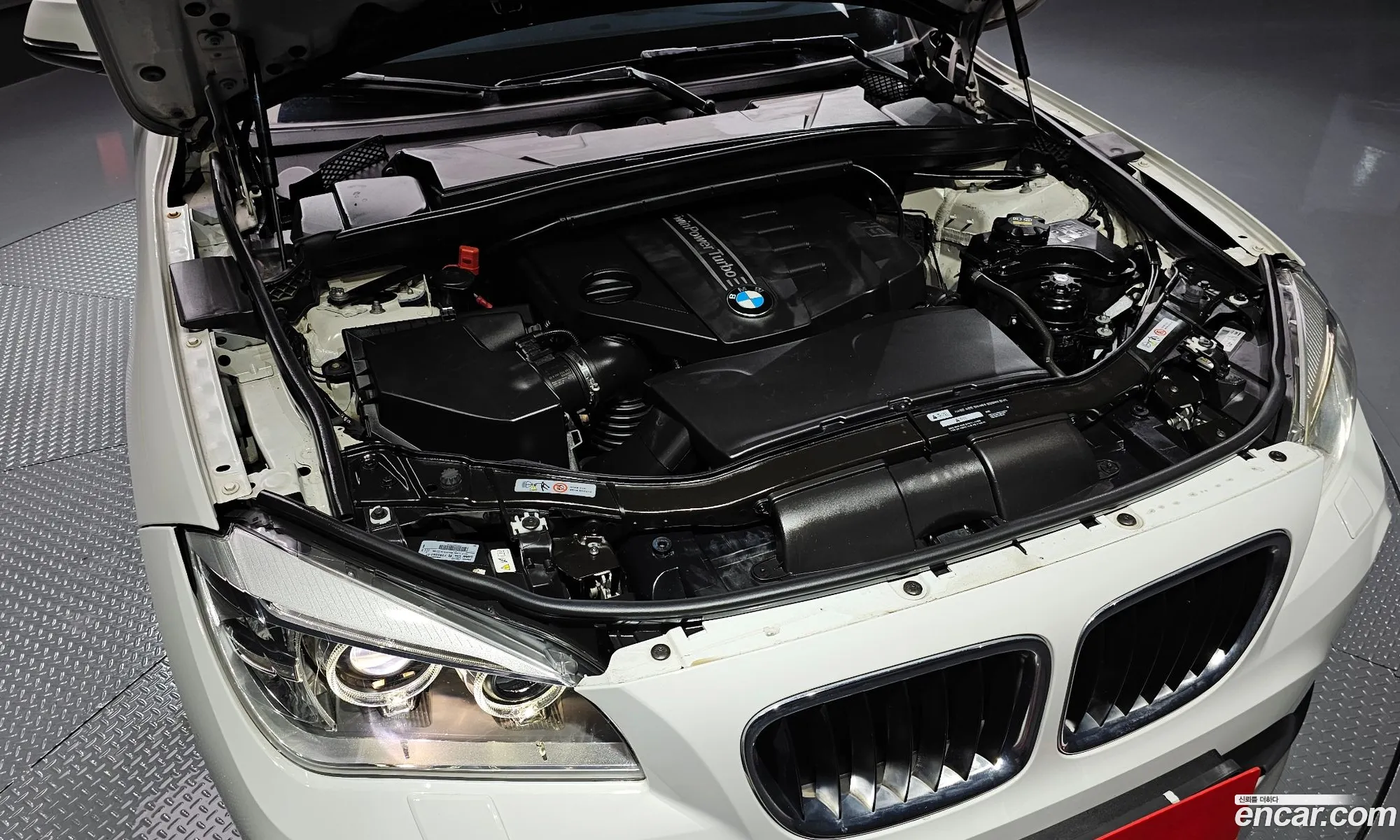 BMW X1 xDrive 20D 2015 - фотография 18181140