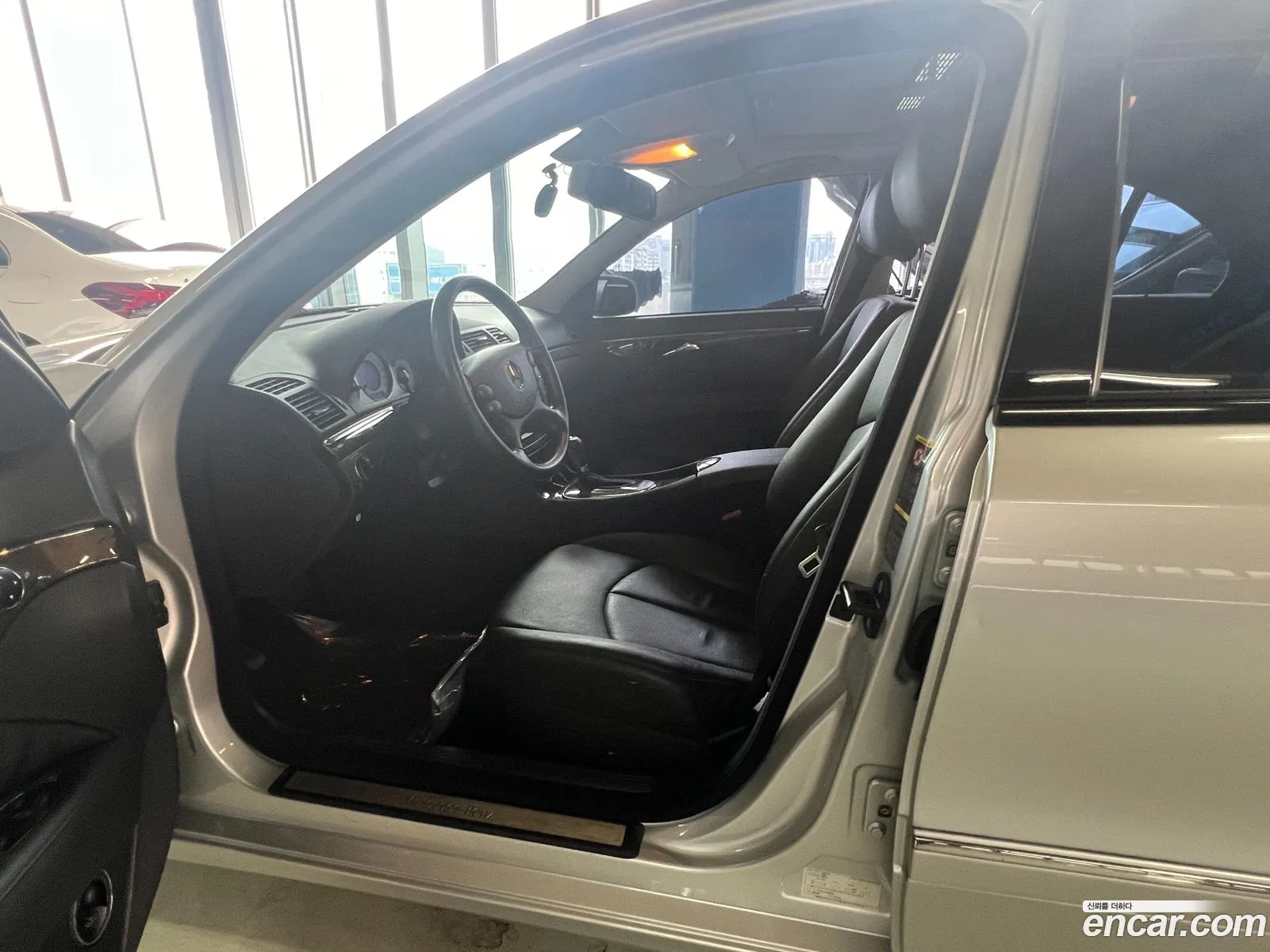 Mercedes-Benz E-Klasse E200K 2009 - фотография 17867460