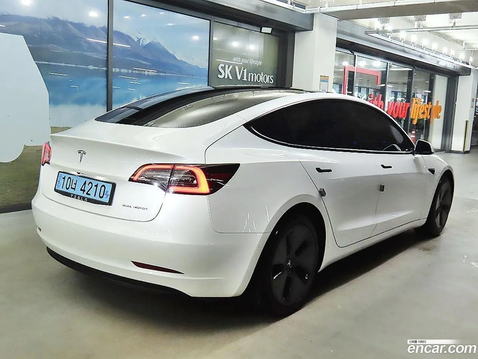 Tesla Model 3 I Long Range 2021 - фотография 15678381