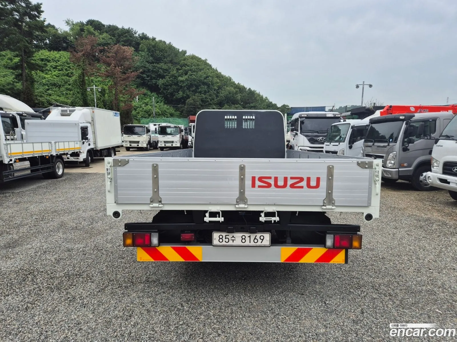 Isuzu Elf Cargo Truck 35 Tons - фотография 3507759
