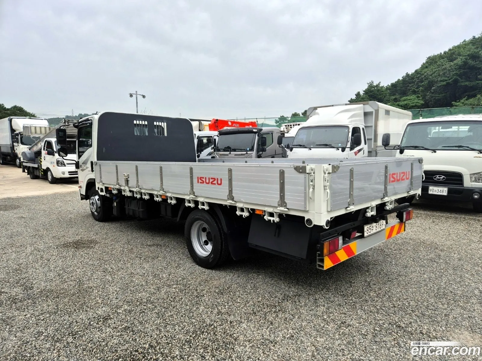 Isuzu Elf Cargo Truck 35 Tons - фотография 3507761