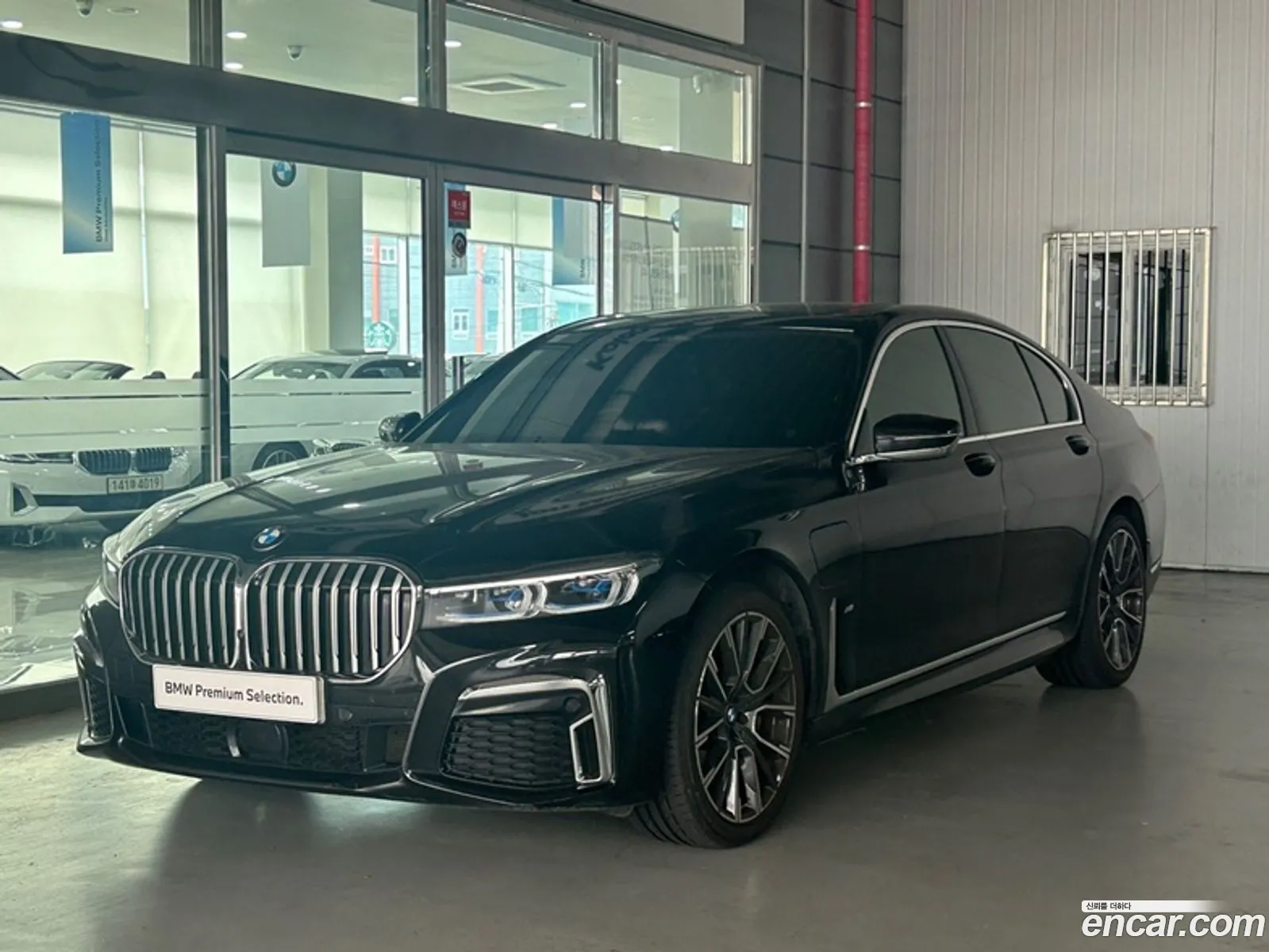 BMW 7 Series G11 745E Iperformance M Sports - фотография 8007660