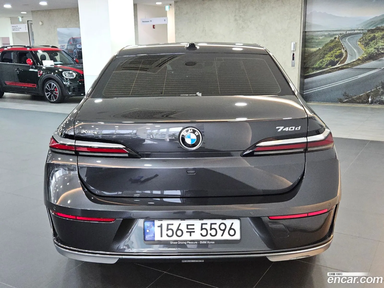 BMW 7 Series G70 740D xDrive Design Pure Excellence - фотография 8372852