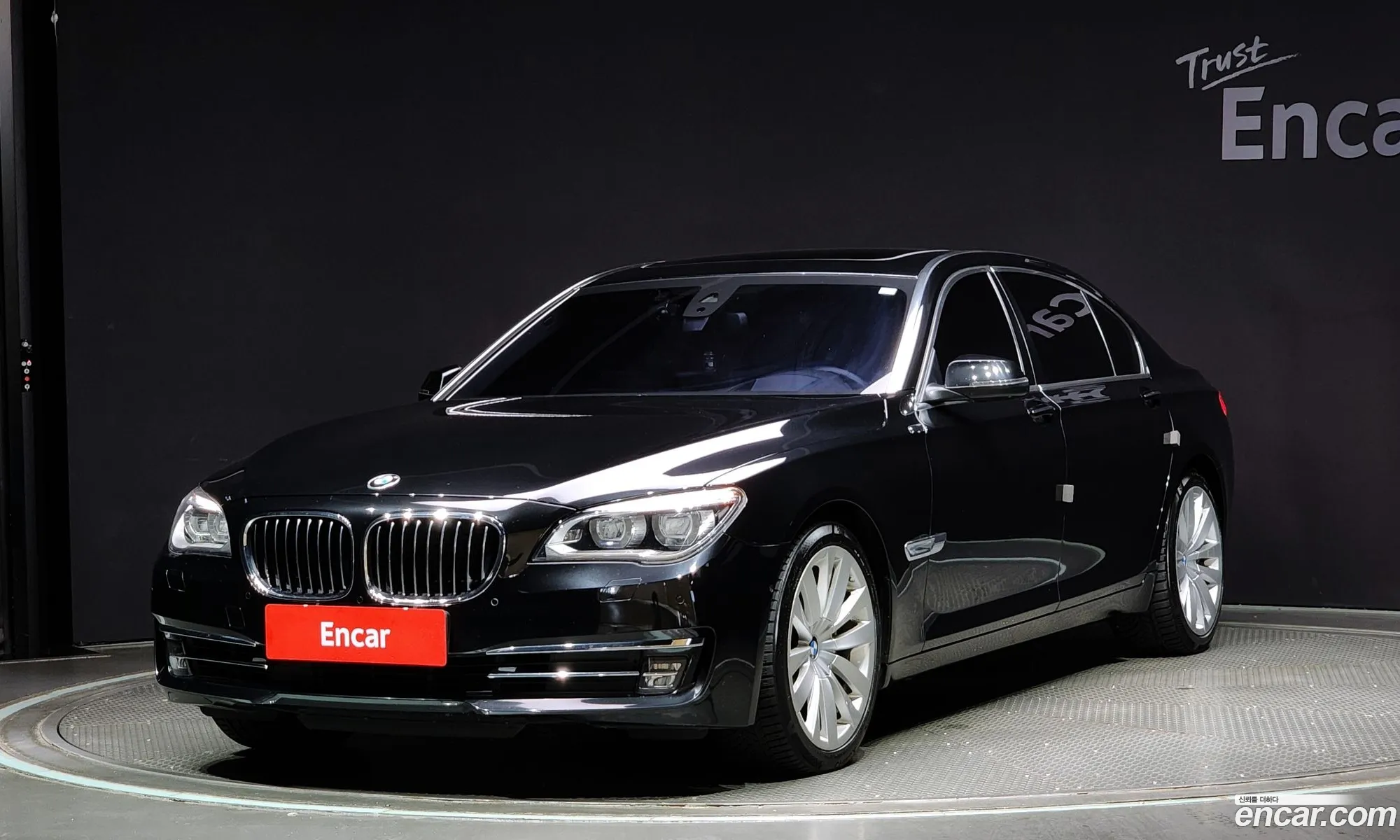 BMW 7 Series F01 750Ld xDrive Individual - фотография 14779827