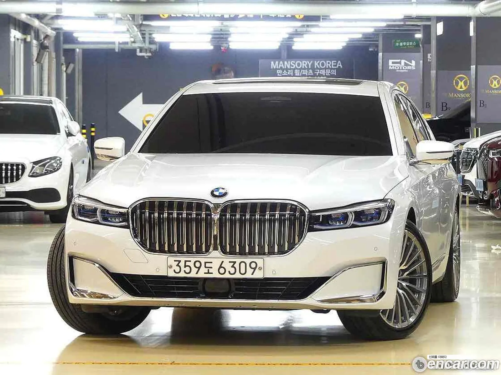 BMW 7 Series G11 740Li xDrive Design Pure Excellence - фотография 12468677