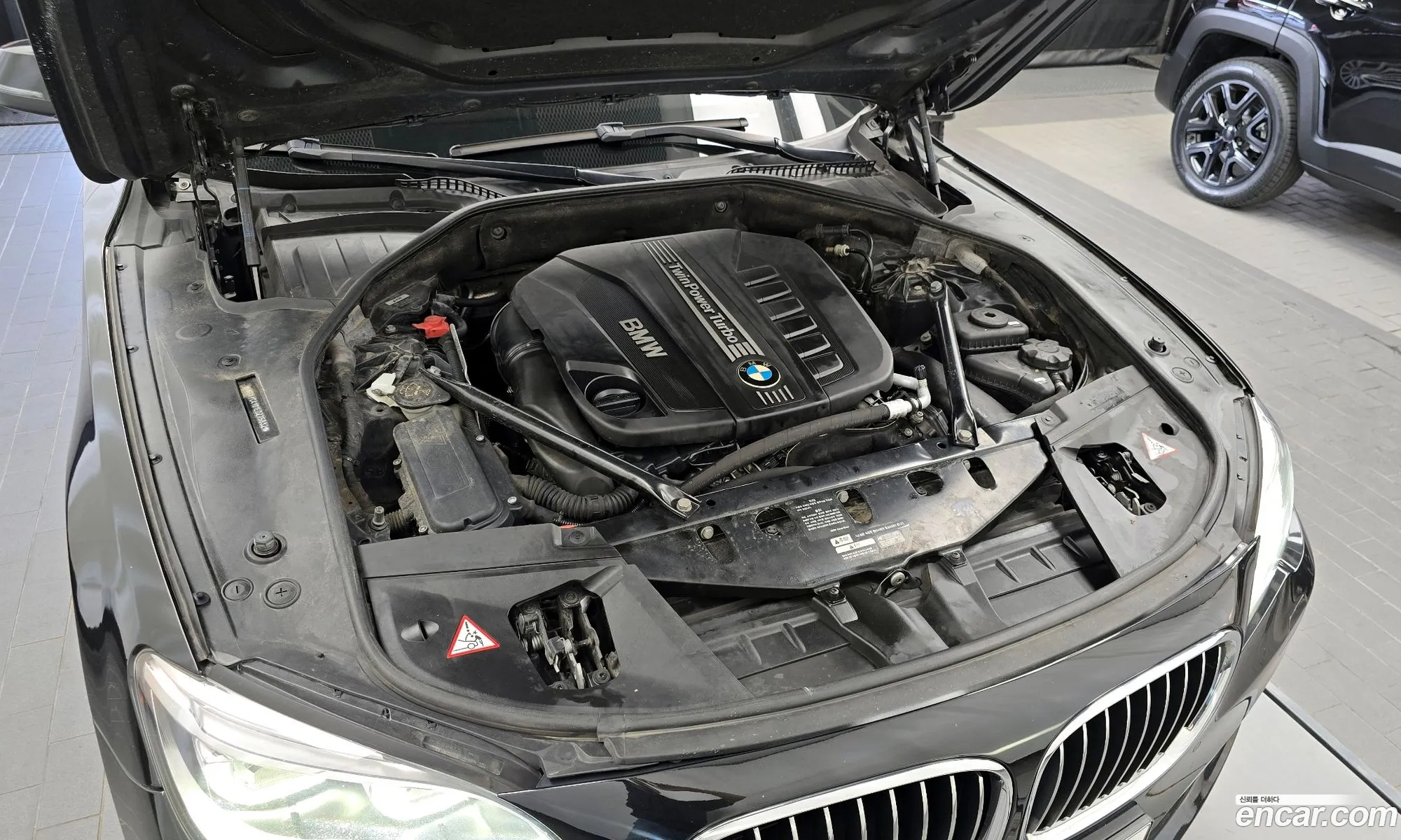 BMW 7 Series F01 730D xDrive - фотография 11570428