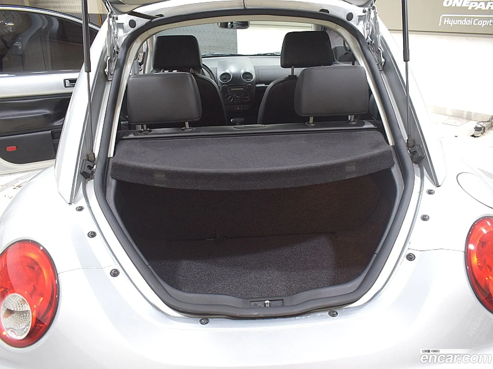 Volkswagen New Beetle Deluxe 20 9C - фотография 12497451