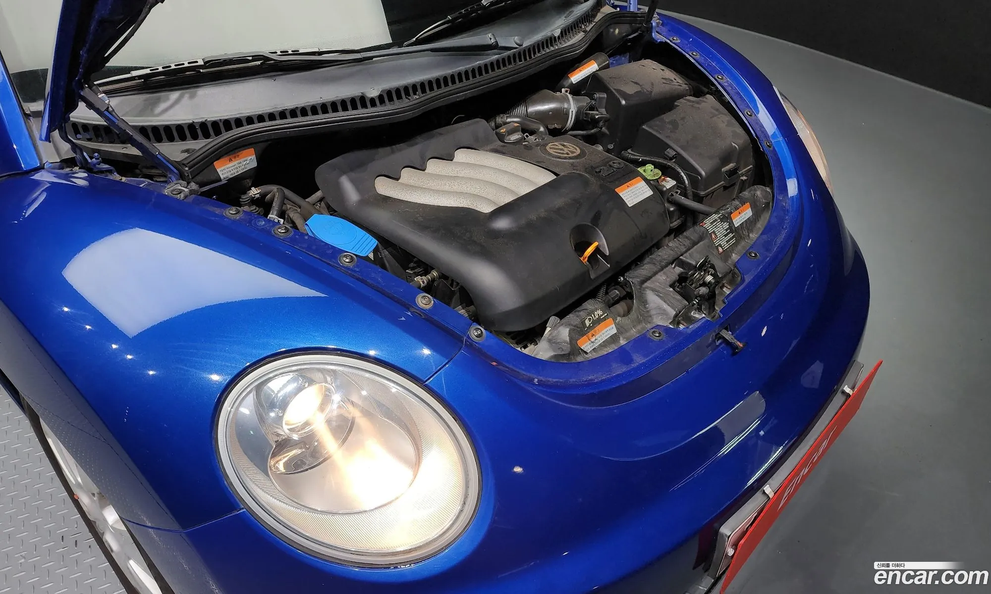 Volkswagen New Beetle Deluxe 20 9C - фотография 12433388